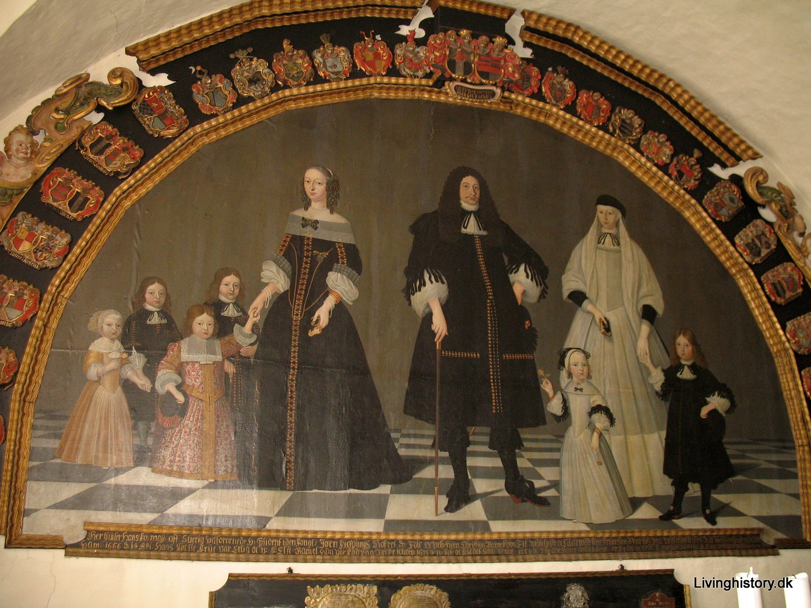 Målning med en man två kvinnor och 6 mindre barn.