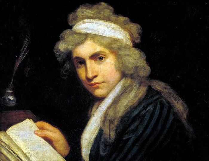 Oljemålning. Mary håller i en uppslagen bok. Hon har en vit sjal knuten runt det lockiga blonda håret. Hennes blick är riktad mot betraktarens 